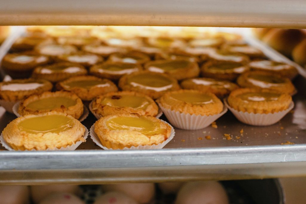 a close up of a tray of cupcakes